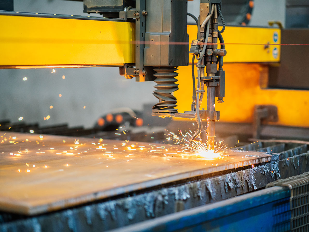 Oxy and plasma profiling machine cutting steel plate
